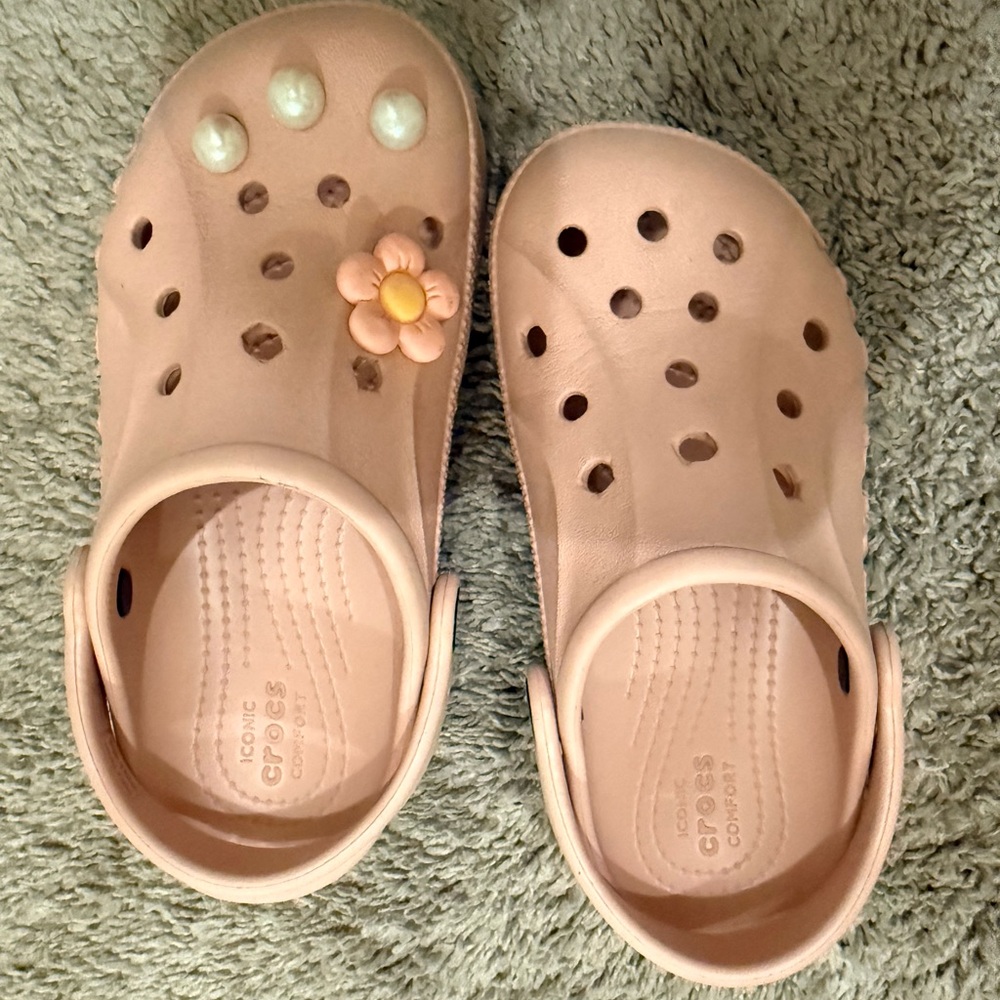 CROCS Kids' Classic Clog in Pale Pink with Flower Charm